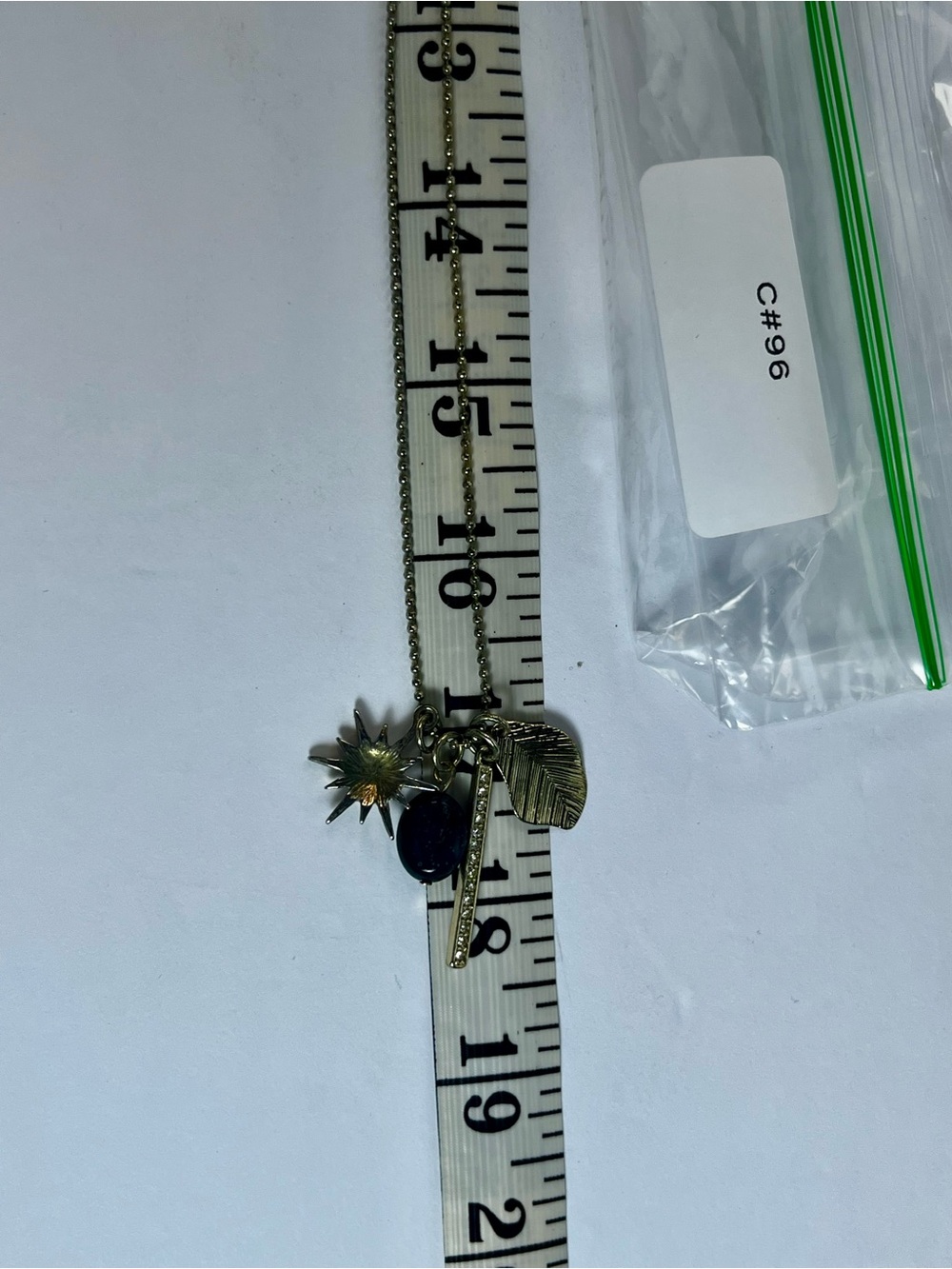 Boho Gold Layered Charm Necklace with Starburst, Leaf, & Crystal Accents - sku96 - Picture 3 of 3